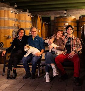 Relative newcomers in Barolo – Enzo Boglietti and his wife Mirella with children Linda and Matteo (and dogs Martina and Bob!)
