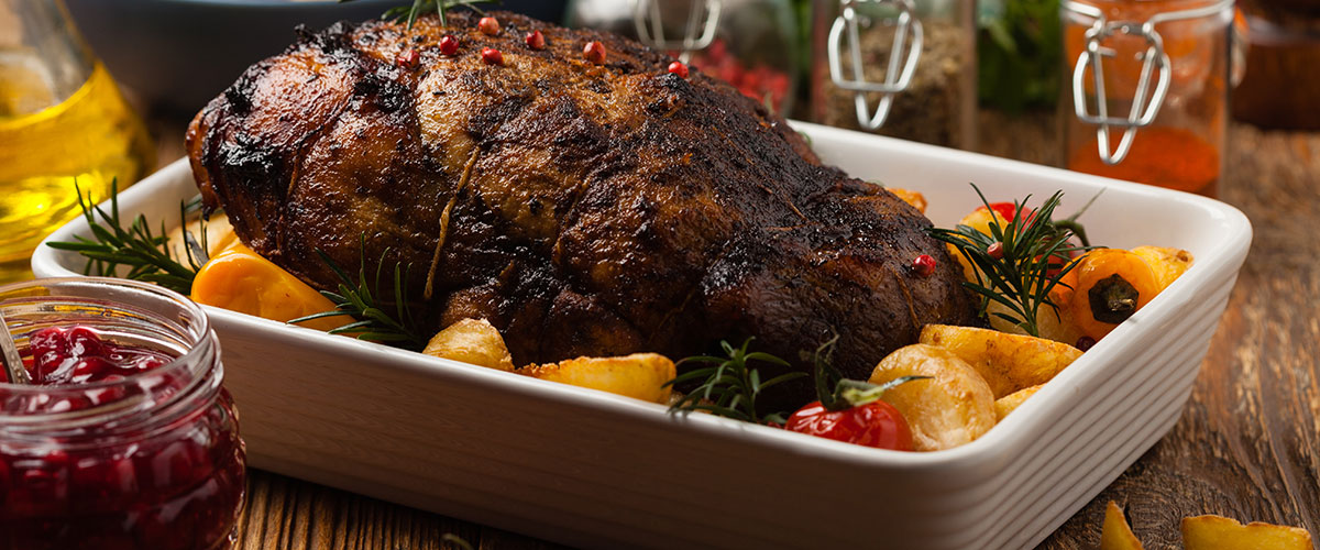 Slow Cooked Lamb with Tapenade and Crispy New Potatoes