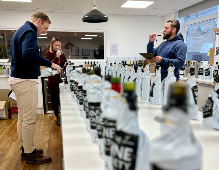 Buyers Matthew, Fiona and Freddy blind tasting wines