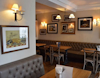 Internally shot of tables and seating at The Salamander pub,  Bath view 3